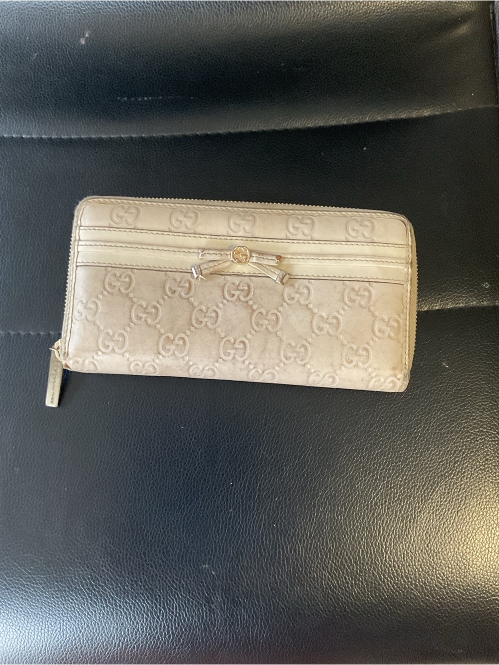 Gucci Beige Zip-Around Monogram Wallet with Gold Accent